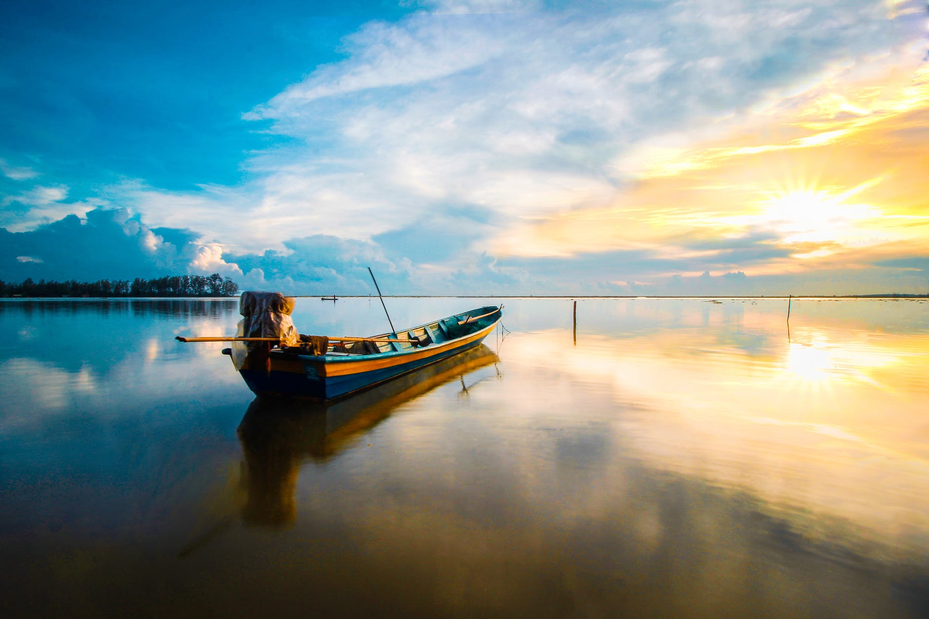 scenic photo of boat during dawn